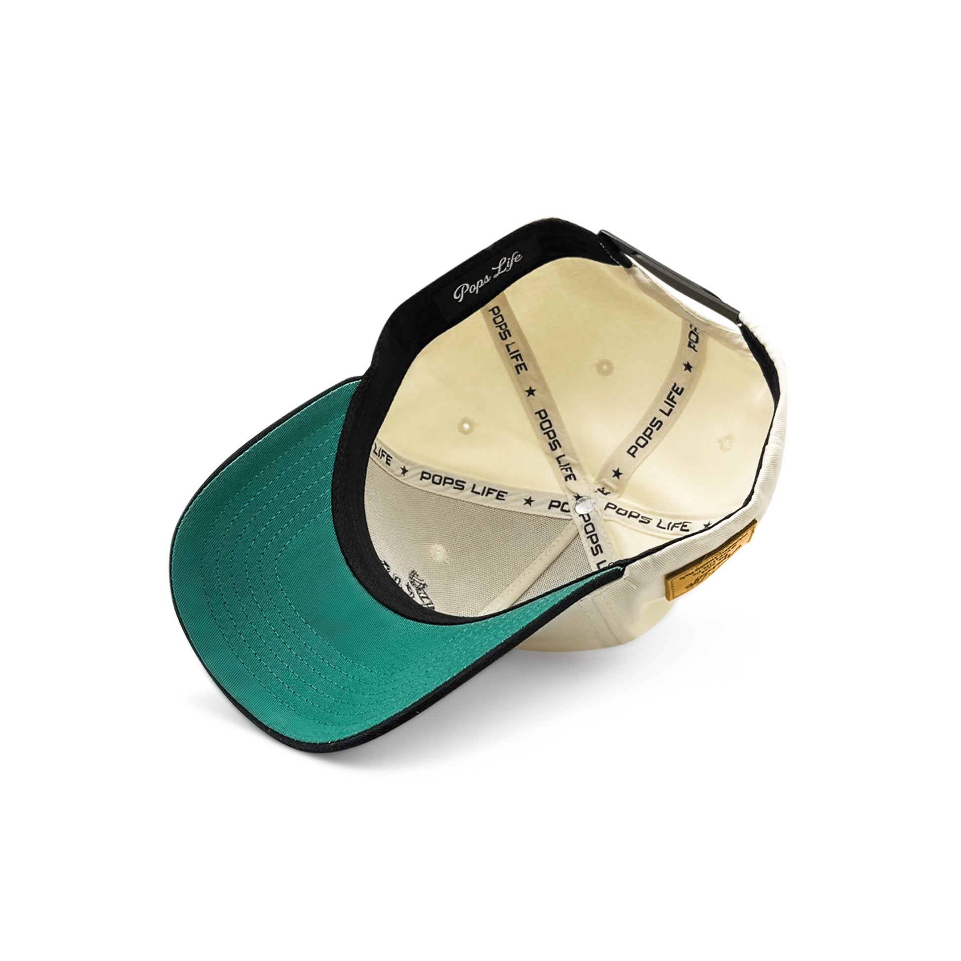 Interior view of the best dad hat featuring a Pops Life branded sweatband, structured panels, and a contrasting green underbill for timeless style and comfort.