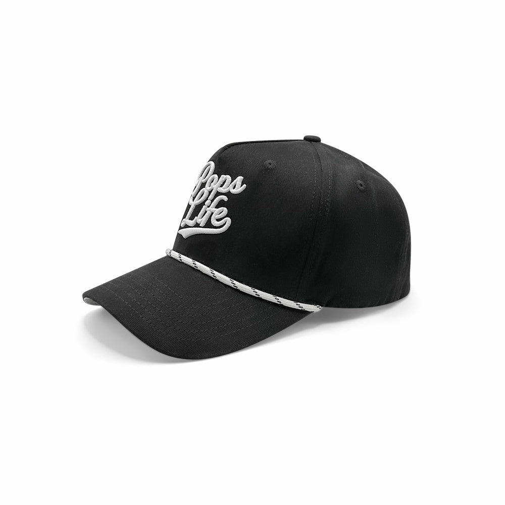 Angled view of a black dad hat showcasing Pops Life logo, white rope detail, and durable design.